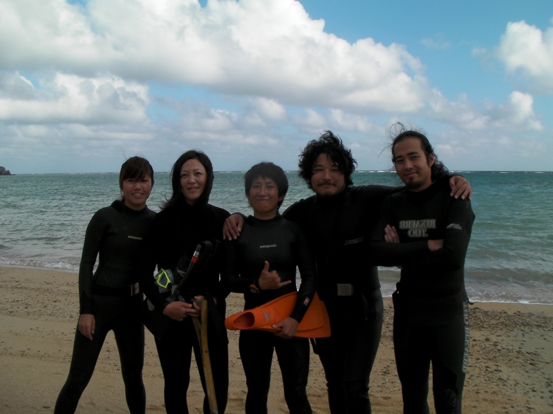 Even in warm Okinawa, it's impossible to spend all day in the water without wearing a wetsuit