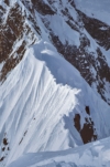 Looking up-route across the “Shovel Traverse,” you can discern all five of my partners. The team was moving from Camp IV to Camp V, and two partners are gathered at Camp V, while three others are negotiating the corniced ridge. Photo: Allen Steck