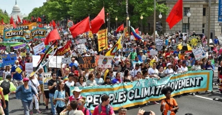 Tens of thousands protest the Trump administration’s assault on the environment at the People’s Climate March in Washington, D.C. Photo: Astrid Riecken