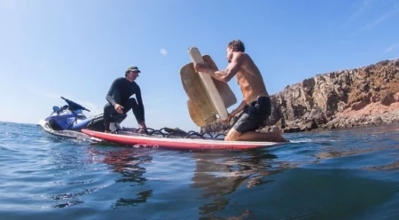 Kyle Thiermann and Greg Long load up pieces of boat wreckage at Isla De Todos Santos. Baja California, Mexico. Photo: Nikki Brooks