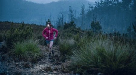 Professional orienteer and wilderness advocate Hanny Allston runs near one of the entry points to the takayna / Tarkine region. Photo: Mikey Schaefer