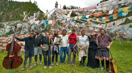 Building friendships without language, Tibetan and American musicians bond at an ancient monastery on the Daqu River. Photo: @tripjenningsvideo