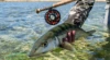 The author admires a bonefish caught and released on the flats of Grand Bahama. Photo: Justin Lewis