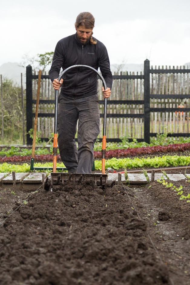 One of the farmers, Francisco Vio, preparing a bed for transplanting with the “lopata