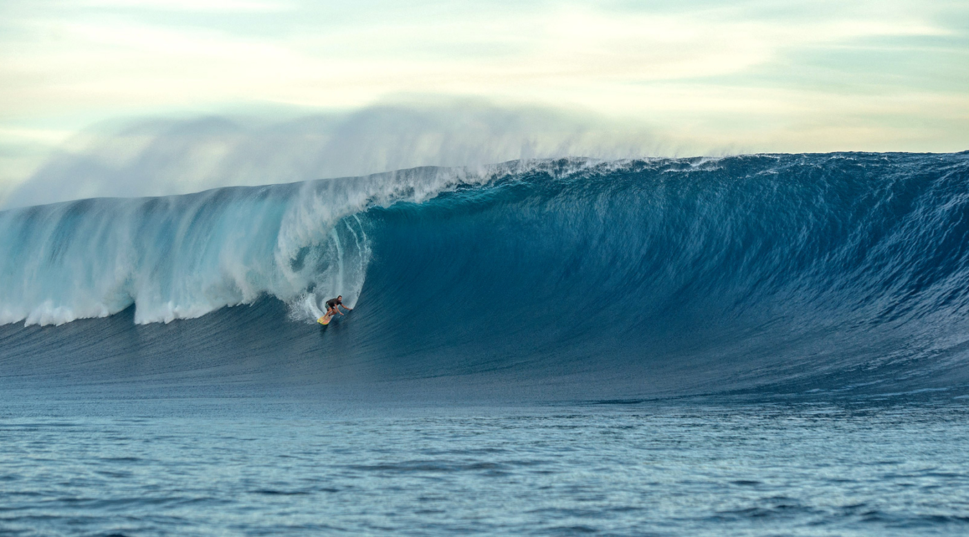 Kohl Christensen wrangling one of the forerunners as the swell began to build. Photo: Daniel Russo
