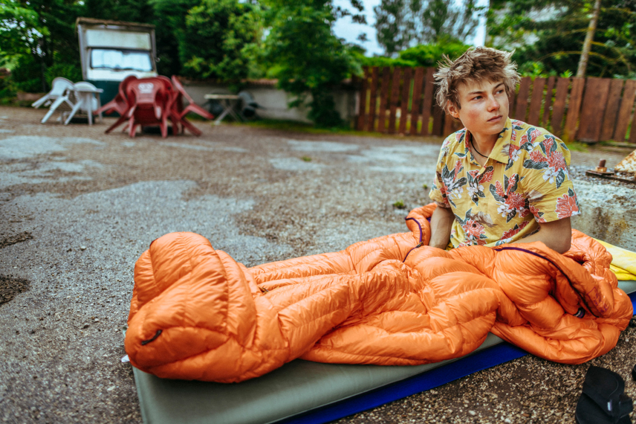 He may be one of the best rock climbers in the world, but Alex still appreciates the dirtbag culture of climbing—case in point, waking up in the rain at a closed gas station on the way to Céüse, France. Photo: Ken Etzel