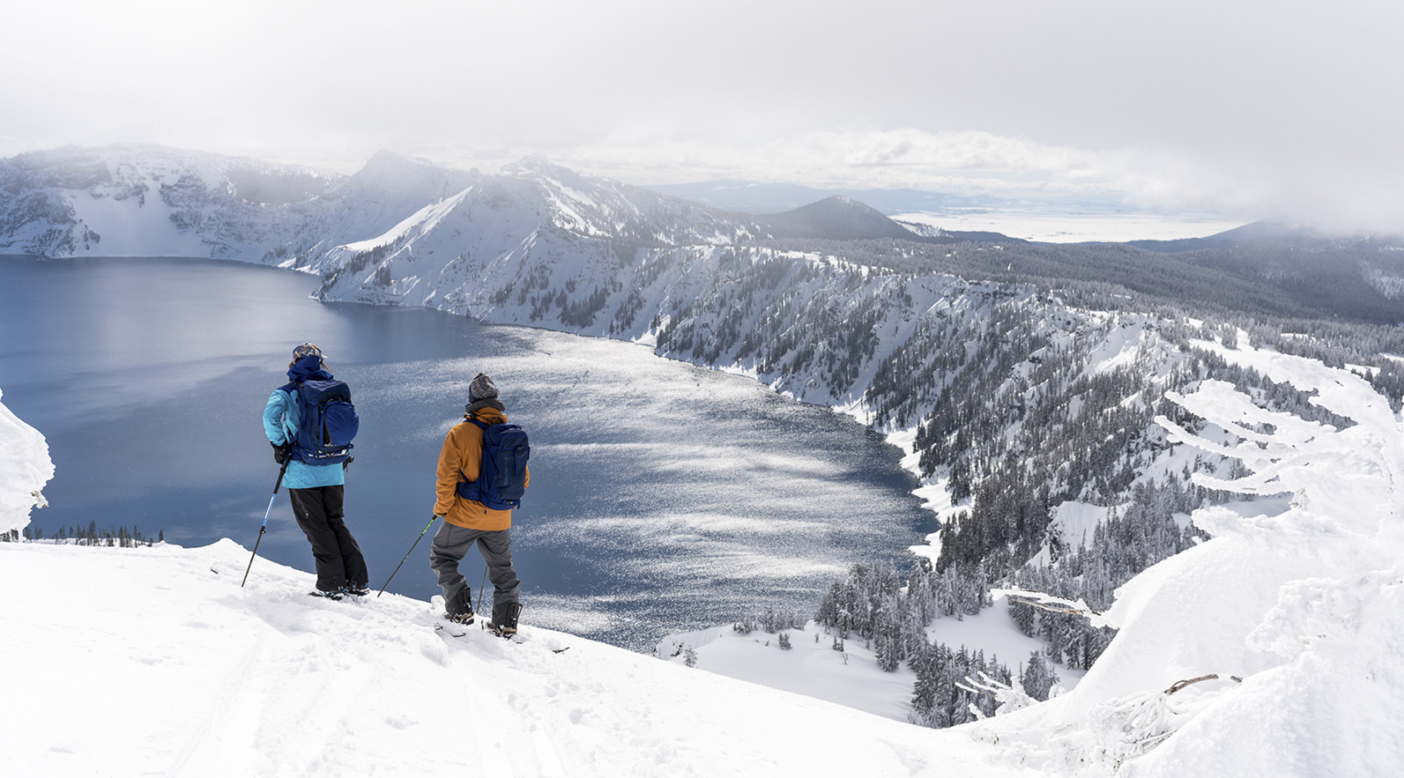 Look, but don’t touch—riding inside the caldera rim is off limits to human travel, due to safety and habitat preservation concerns. Here, Leah Evans and Kael Martin stand on the boundary of the no-go zone and mind surf lines into the lake. Photo: Colin Wiseman