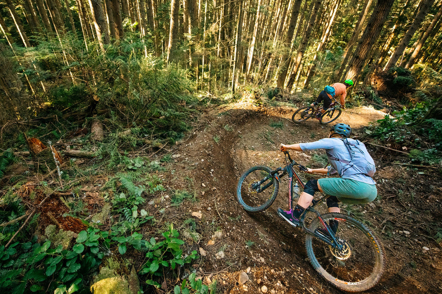 Bonnie Burke (front) and Eric Brown (rear) play follow the leader on their way down Cougar Ridge, a formerly unsanctioned, downhill-oriented trail linking Galbraith to the reconveyance’s southern side. Photo: Paris Gore