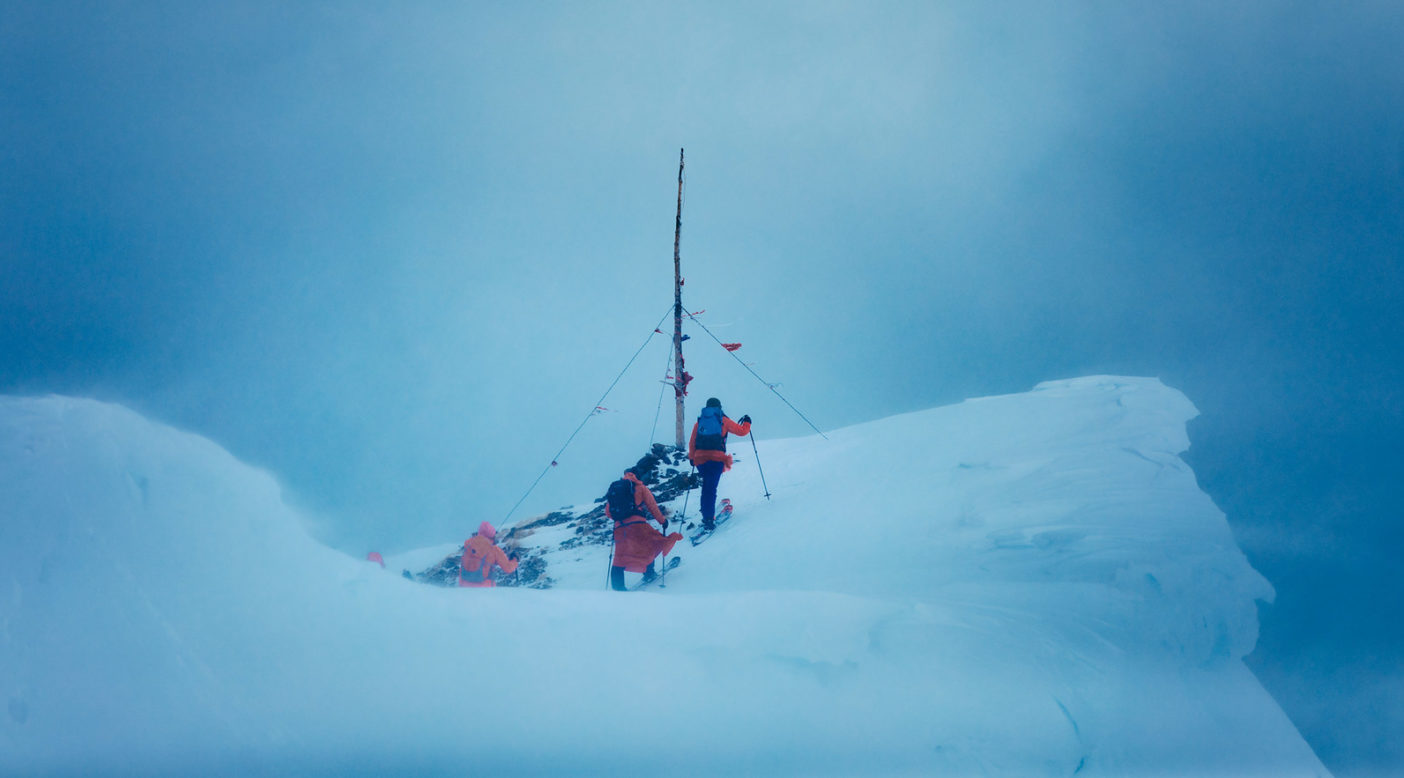 Local skiers approach the summit of Red Lady, a peak in the Elk Mountains near Crested Butte, Colorado, to readorn the Lady’s crown with custom prayer flags that honor the mountain’s important role in the community. Photo: Forest Woodward