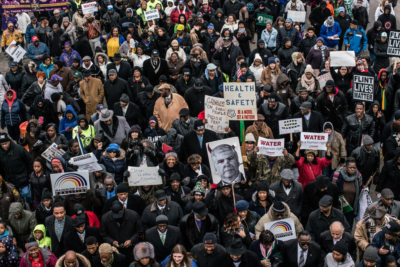 Water is a human right. On February 19th, 2016, Reverend Jesse Jackson led more than 500 people past the abandoned General Motors plants and to the Flint Water tower in protest of the water crisis in Flint, Michigan. Photo: Zack Canepari