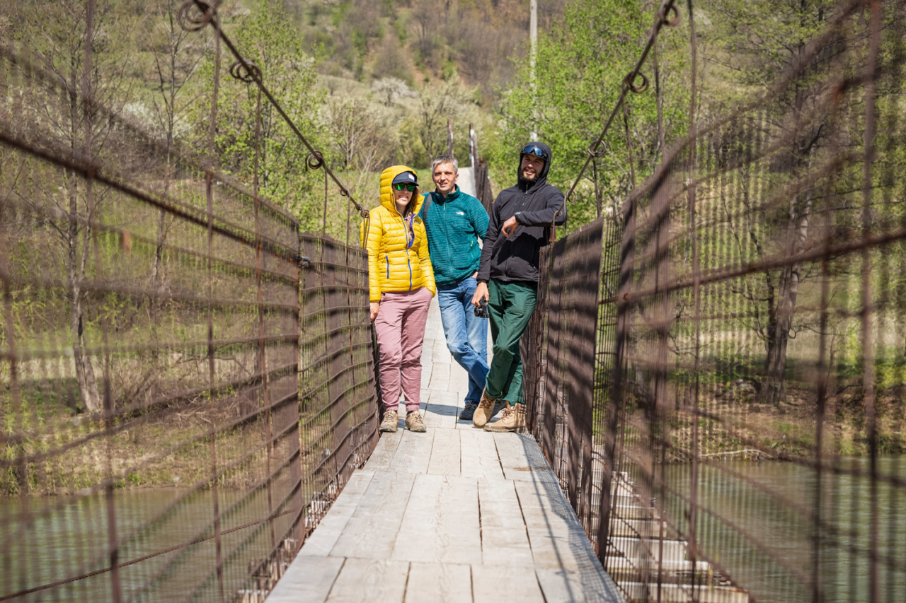Waiting for kayakers on the Buzău River, Romania, during the fourth Balkan Rivers Tour in 2019. We came here to help local river defender Cătălin Câmpeanu (in the middle) in his fight to save Bâsca Mare River, a tributary to Buzău threatened by a diversion dam that would dry up the river. Photo: Katja Pokorn
