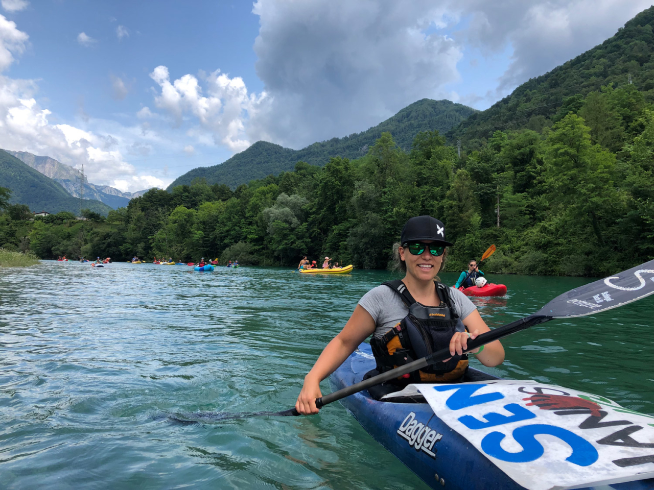 Paddling with 150 other river-lovers from our base camp to a reservoir at Most na Soči, where we held the Free Soča flotilla asking for the removal of a dam on this emerald beauty and setting a new standard for Balkan rivers. Photo: Primož Knap