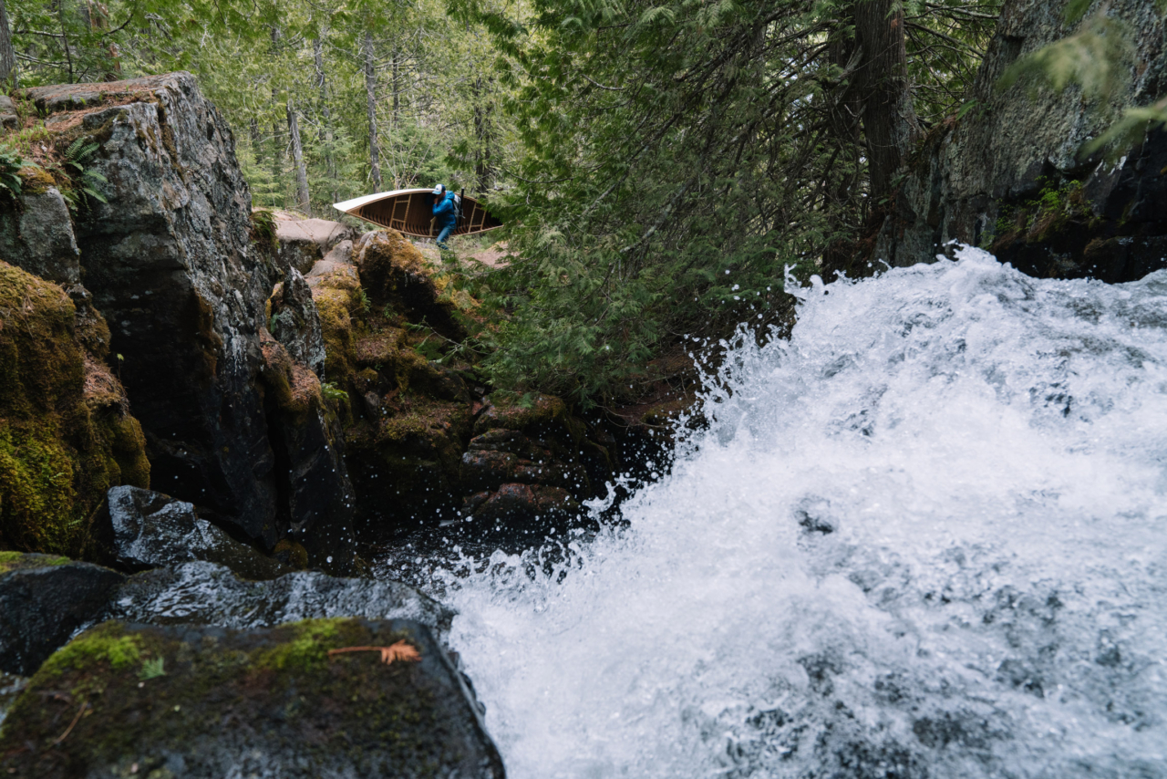 When you can’t go down, you’ve gotta go around. The author skips the unfishable whitewater in the Boundary Waters Canoe Area Wilderness. TONY CZECH